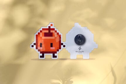 Pin Junimo naranja Stardew Valley pixel art